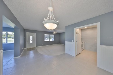 One or more photo(s) has been virtually staged. UPDATED AND on Kings Point Executive Golf Course in Florida - for sale on GolfHomes.com, golf home, golf lot