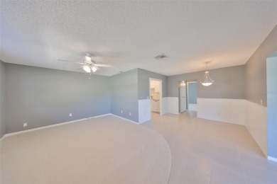 One or more photo(s) has been virtually staged. UPDATED AND on Kings Point Executive Golf Course in Florida - for sale on GolfHomes.com, golf home, golf lot