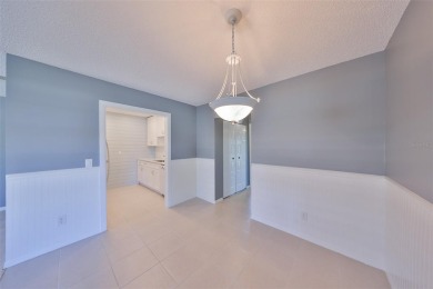 One or more photo(s) has been virtually staged. UPDATED AND on Kings Point Executive Golf Course in Florida - for sale on GolfHomes.com, golf home, golf lot