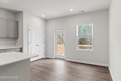 The Givens offers a beautifully crafted two-story design that on Harbour Point Golf Club in North Carolina - for sale on GolfHomes.com, golf home, golf lot