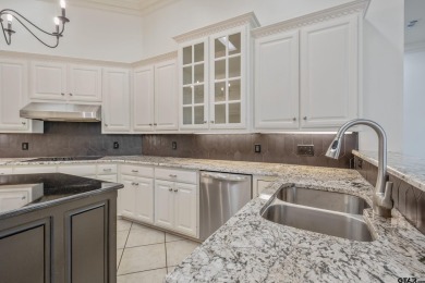 Located in Hollytree, this stunning home offers 4 spacious on Hollytree Country Club in Texas - for sale on GolfHomes.com, golf home, golf lot