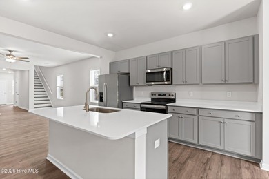 The Givens offers a beautifully crafted two-story design that on Harbour Point Golf Club in North Carolina - for sale on GolfHomes.com, golf home, golf lot