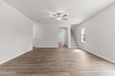 The Givens offers a beautifully crafted two-story design that on Harbour Point Golf Club in North Carolina - for sale on GolfHomes.com, golf home, golf lot