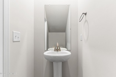 The Givens offers a beautifully crafted two-story design that on Harbour Point Golf Club in North Carolina - for sale on GolfHomes.com, golf home, golf lot