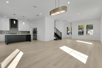 STUNNING NEW CONSTRUCTION w/ GARAGE APT in COLLEGE PARK - Prime on Dubsdread Golf Course in Florida - for sale on GolfHomes.com, golf home, golf lot