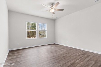 The Givens offers a beautifully crafted two-story design that on Harbour Point Golf Club in North Carolina - for sale on GolfHomes.com, golf home, golf lot