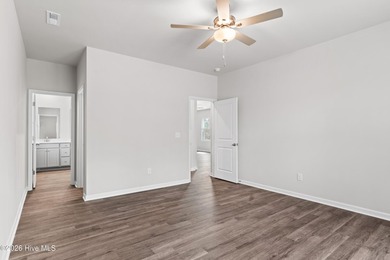 The Givens offers a beautifully crafted two-story design that on Harbour Point Golf Club in North Carolina - for sale on GolfHomes.com, golf home, golf lot