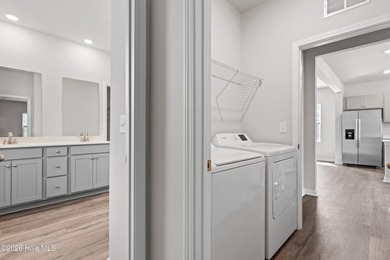 The Givens offers a beautifully crafted two-story design that on Harbour Point Golf Club in North Carolina - for sale on GolfHomes.com, golf home, golf lot