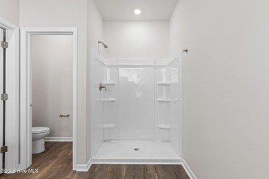 The Givens offers a beautifully crafted two-story design that on Harbour Point Golf Club in North Carolina - for sale on GolfHomes.com, golf home, golf lot