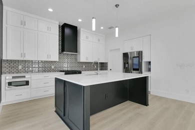 STUNNING NEW CONSTRUCTION w/ GARAGE APT in COLLEGE PARK - Prime on Dubsdread Golf Course in Florida - for sale on GolfHomes.com, golf home, golf lot