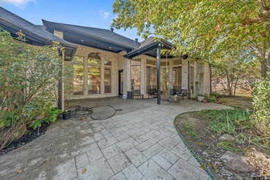 Located in Hollytree, this stunning home offers 4 spacious on Hollytree Country Club in Texas - for sale on GolfHomes.com, golf home, golf lot