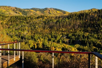 Set on one acre surrounded by sweeping natural beauty, 705 on Rollingstone Ranch Golf Club in Colorado - for sale on GolfHomes.com, golf home, golf lot