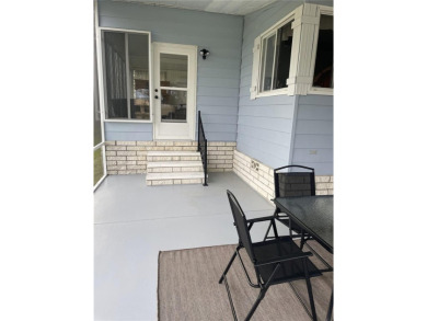 FULLY RENOVATED HOME in ZELLWOOD STATION, 2 bedrooms, 2 baths on Zellwood Station Country Club in Florida - for sale on GolfHomes.com, golf home, golf lot