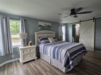 FULLY RENOVATED HOME in ZELLWOOD STATION, 2 bedrooms, 2 baths on Zellwood Station Country Club in Florida - for sale on GolfHomes.com, golf home, golf lot
