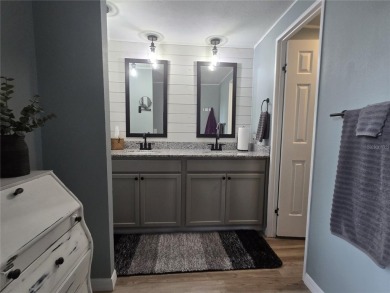 FULLY RENOVATED HOME in ZELLWOOD STATION, 2 bedrooms, 2 baths on Zellwood Station Country Club in Florida - for sale on GolfHomes.com, golf home, golf lot