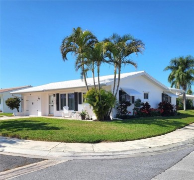 Live high and dry in this beautifully upgraded home located in on Mainlands Golf Club in Florida - for sale on GolfHomes.com, golf home, golf lot
