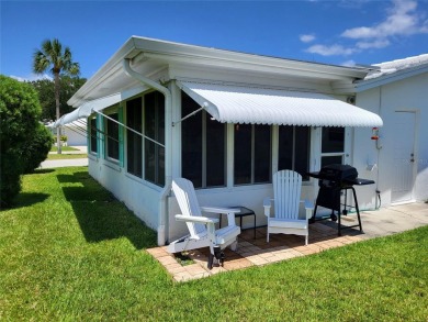 Live high and dry in this beautifully upgraded home located in on Mainlands Golf Club in Florida - for sale on GolfHomes.com, golf home, golf lot