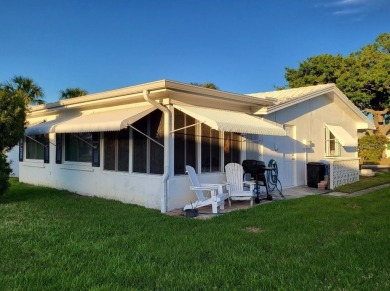 Live high and dry in this beautifully upgraded home located in on Mainlands Golf Club in Florida - for sale on GolfHomes.com, golf home, golf lot