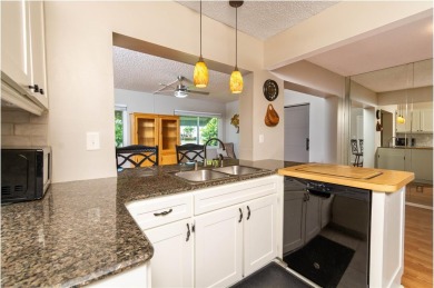 Live high and dry in this beautifully upgraded home located in on Mainlands Golf Club in Florida - for sale on GolfHomes.com, golf home, golf lot