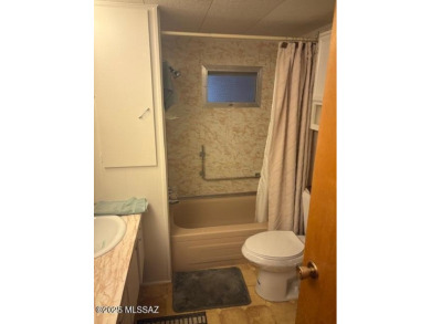 Very nice well cared for fully furnished home with Ramada roof on Tucson Estates Golf Course in Arizona - for sale on GolfHomes.com, golf home, golf lot