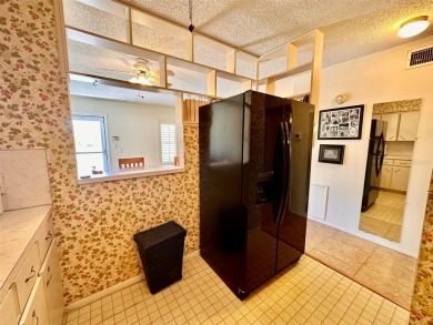 This turnkey 1-bedroom, 1-bathroom home comes fully furnished on On Top Of The World Golf Course in Florida - for sale on GolfHomes.com, golf home, golf lot
