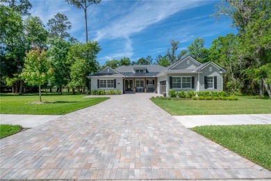 Discover the epitome of luxury living in this 4-bedroom on Southern Hills Plantation Club in Florida - for sale on GolfHomes.com, golf home, golf lot