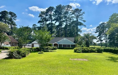 Beautiful home on the golf course in a gated community! Home has on Santee-Cooper Country Club in South Carolina - for sale on GolfHomes.com, golf home, golf lot