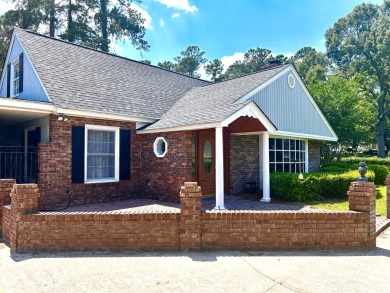 Beautiful home on the golf course in a gated community! Home has on Santee-Cooper Country Club in South Carolina - for sale on GolfHomes.com, golf home, golf lot