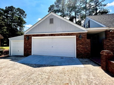 Beautiful home on the golf course in a gated community! Home has on Santee-Cooper Country Club in South Carolina - for sale on GolfHomes.com, golf home, golf lot