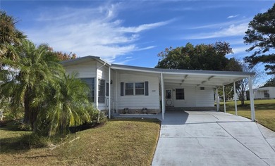 LAND OWNED 2-bedroom 2 bath manufactured home in Zellwood on Zellwood Station Country Club in Florida - for sale on GolfHomes.com, golf home, golf lot