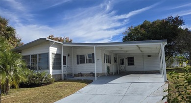 LAND OWNED 2-bedroom 2 bath manufactured home in Zellwood on Zellwood Station Country Club in Florida - for sale on GolfHomes.com, golf home, golf lot