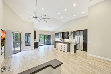 Single-level remodeled jewel box on a prime corner overlooking on Gainey Ranch Golf Club in Arizona - for sale on GolfHomes.com, golf home, golf lot