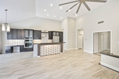Single-level remodeled jewel box on a prime corner overlooking on Gainey Ranch Golf Club in Arizona - for sale on GolfHomes.com, golf home, golf lot