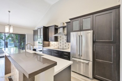 Single-level remodeled jewel box on a prime corner overlooking on Gainey Ranch Golf Club in Arizona - for sale on GolfHomes.com, golf home, golf lot