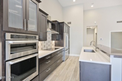 Single-level remodeled jewel box on a prime corner overlooking on Gainey Ranch Golf Club in Arizona - for sale on GolfHomes.com, golf home, golf lot