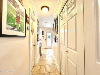 Updated End Unit Townhome with additional heated/cooled sq on Diamondhead Country Club in Mississippi - for sale on GolfHomes.com, golf home, golf lot
