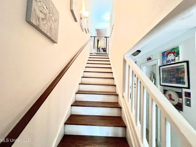 Updated End Unit Townhome with additional heated/cooled sq on Diamondhead Country Club in Mississippi - for sale on GolfHomes.com, golf home, golf lot