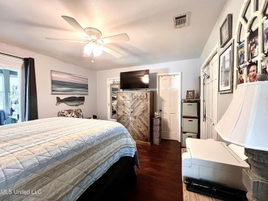 Updated End Unit Townhome with additional heated/cooled sq on Diamondhead Country Club in Mississippi - for sale on GolfHomes.com, golf home, golf lot
