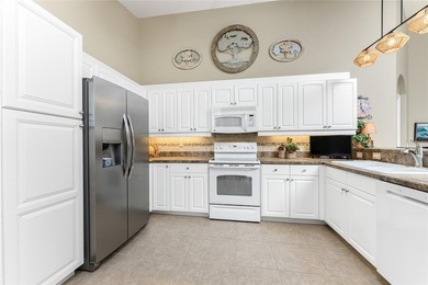 THREE BEDROOM CONDO, PARTIALLY FURNISHED, WITH GARAGE IN on Plantation Golf and Country Club in Florida - for sale on GolfHomes.com, golf home, golf lot