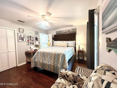 Updated End Unit Townhome with additional heated/cooled sq on Diamondhead Country Club in Mississippi - for sale on GolfHomes.com, golf home, golf lot