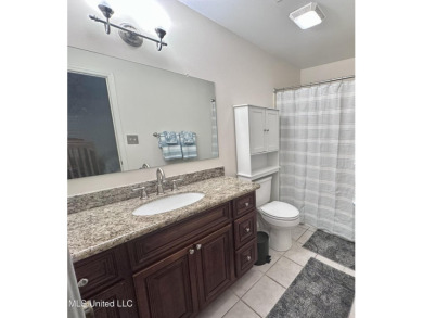 Updated End Unit Townhome with additional heated/cooled sq on Diamondhead Country Club in Mississippi - for sale on GolfHomes.com, golf home, golf lot