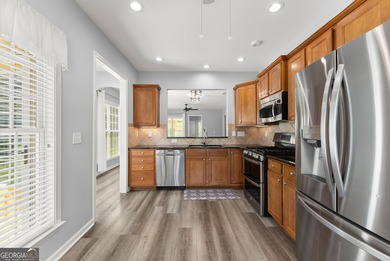 Stunning Show home in The Village at Deaton Creek with premium on Reunion Golf Club in Georgia - for sale on GolfHomes.com, golf home, golf lot