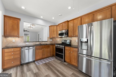 Stunning Show home in The Village at Deaton Creek with premium on Reunion Golf Club in Georgia - for sale on GolfHomes.com, golf home, golf lot