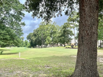 Updated End Unit Townhome with additional heated/cooled sq on Diamondhead Country Club in Mississippi - for sale on GolfHomes.com, golf home, golf lot