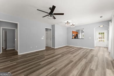 Stunning Show home in The Village at Deaton Creek with premium on Reunion Golf Club in Georgia - for sale on GolfHomes.com, golf home, golf lot