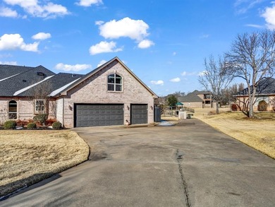 Impressive curb appeal welcomes you from the moment you arrive on Pecan Plantation Country Club in Texas - for sale on GolfHomes.com, golf home, golf lot