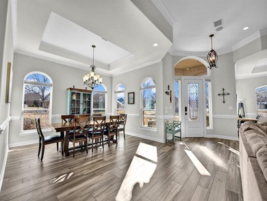 Impressive curb appeal welcomes you from the moment you arrive on Pecan Plantation Country Club in Texas - for sale on GolfHomes.com, golf home, golf lot