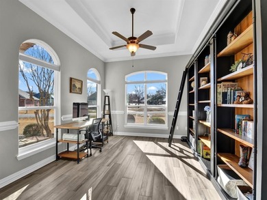 Impressive curb appeal welcomes you from the moment you arrive on Pecan Plantation Country Club in Texas - for sale on GolfHomes.com, golf home, golf lot