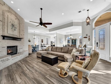 Impressive curb appeal welcomes you from the moment you arrive on Pecan Plantation Country Club in Texas - for sale on GolfHomes.com, golf home, golf lot