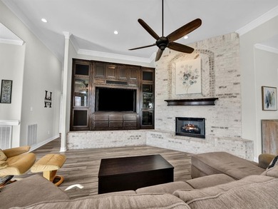 Impressive curb appeal welcomes you from the moment you arrive on Pecan Plantation Country Club in Texas - for sale on GolfHomes.com, golf home, golf lot